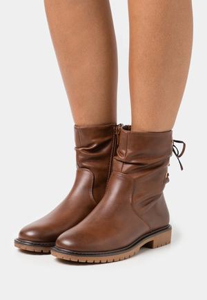 Women's Anna Field Classic Flat Zip UP Ankle Boots Brown | ORNHXWF-46